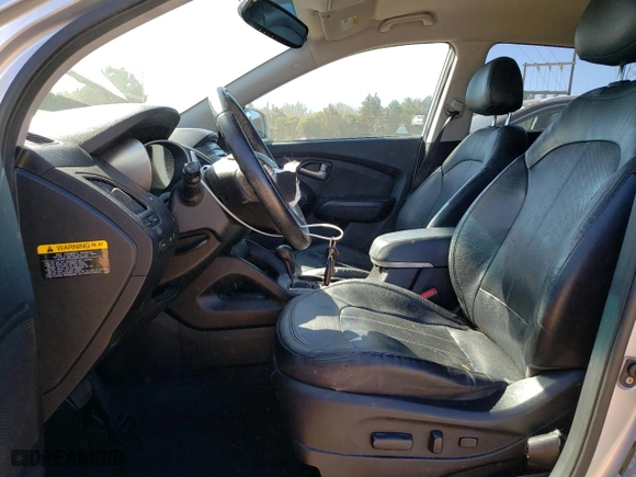 2012 Hyundai Tucson Limited with VIN KM8JU3AC4CU443716, listed as a Copart auction lot 47302015 with 167,437 mi miles and Salvage Title. Bid and sale history available at carsss.com. Image 7.