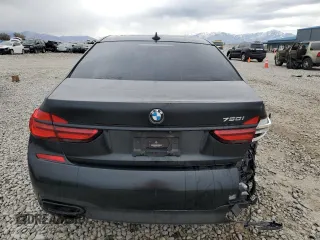 2018 BMW 7 Series 750i with VIN WBA7F0C55JGM23537, listed as a Copart auction lot 76824074 with 64,682 mi miles and Salvage Title. Bid and sale history available at carsss.com. Image 6.