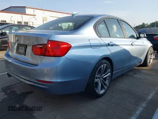 2012 BMW 3 Series 328i with VIN WBA3A5C50CF346823, listed as a IAAI auction lot 42161682 with 76,729 mi miles and . Bid and sale history available at carsss.com. Image 4.