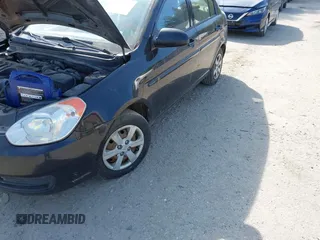 2009 Hyundai Accent Auto GLS z VIN KMHCN46C39U334712, wystawiony jako IAAI lot #42334874 z przebiegiem 193 090 mil mil oraz . Historia ofert i sprzedaży dostępna na DreamBid. Obrazek 13.