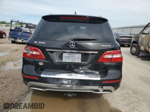 2014 Mercedes-Benz M 350 with VIN 4JGDA5HB2EA330804, listed as a Copart auction lot 52989925 with 127,003 mi miles and Salvage title. Bid and sale history available at DreamBid. Image 6.