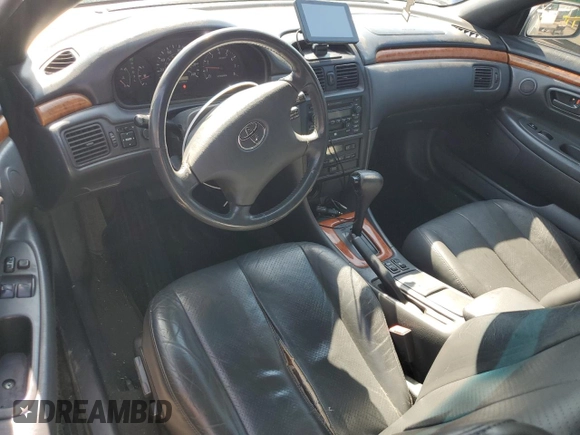 2003 Toyota Solara SE z VIN 2T1FF28P53C610072, wystawiony jako Copart lot #56075605 z przebiegiem 271 457 mil mil oraz Szkoda całkowita • Salvage title. Historia ofert i sprzedaży dostępna na DreamBid. Obrazek 8.