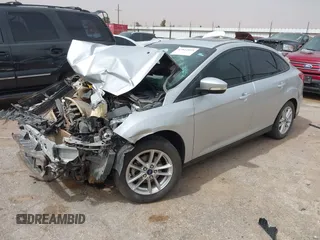 2016 Ford Focus SE with VIN 1FADP3F20GL338536, listed as a IAAI auction lot 41812805 with 130,943 mi miles. Bid and sale history available at carsss.com. Image 2.