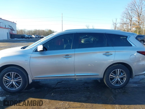 2019 Infiniti QX60 LUXE with VIN 5N1DL0MN3KC568514, listed as a IAAI auction lot 41308997 with 96,807 mi miles. Bid and sale history available at carsss.com. Image 14.