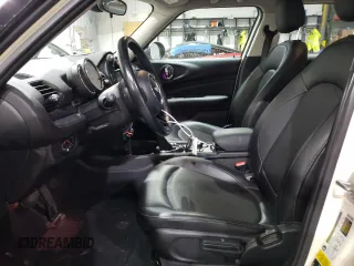 2017 MINI Clubman Cooper with VIN WMWLU1C57H2F27158, listed as a Copart auction lot 77672744 with 73,850 mi miles and Salvage Title. Bid and sale history available at carsss.com. Image 7.