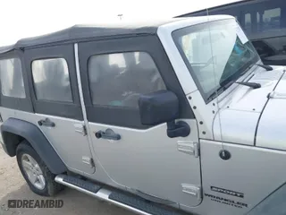 2010 Jeep Wrangler Unlimited Sport with VIN 1J4BA3H10AL112599, listed as a IAAI auction lot 41739263 with 156,301 mi miles. Bid and sale history available at carsss.com. Image 13.