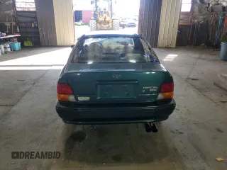 1996 Toyota Tercel DX z VIN JT2BC52L7T7044201, wystawiony jako Copart lot #77190074 z przebiegiem Nie podano mil oraz Szkoda całkowita • Salvage title. Historia ofert i sprzedaży dostępna na DreamBid. Obrazek 6.