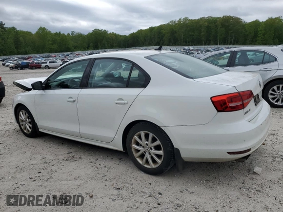 2015 Volkswagen Jetta SE z VIN 3VWD17AJ8FM212937, wystawiony jako Copart lot #56936995 z przebiegiem 99 158 mil mil oraz Czysty tytuł • Clean title. Historia ofert i sprzedaży dostępna na DreamBid. Obrazek 2.