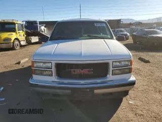 1999 GMC Denali z VIN 1GKEK13R5XR503159, wystawiony jako Copart lot #89018655 z przebiegiem 229 819 mil mil oraz Czysty tytuł • Clean title. Historia ofert i sprzedaży dostępna na DreamBid. Obrazek 5.