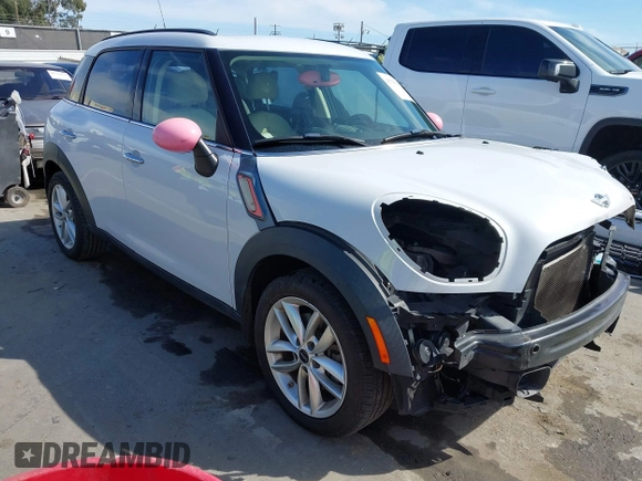 2014 MINI Countryman S with VIN WMWZC3C52EWP26869, listed as a IAAI auction lot 41756310 with 91,941 mi miles and . Bid and sale history available at DreamBid. Image 1.