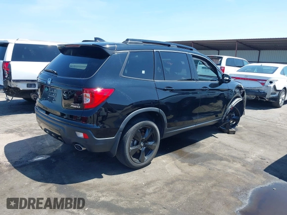 2021 Honda Passport Elite with VIN 5FNYF8H07MB003506, listed as a IAAI auction lot 42571906 with 42,323 mi miles and . Bid and sale history available at DreamBid. Image 4.