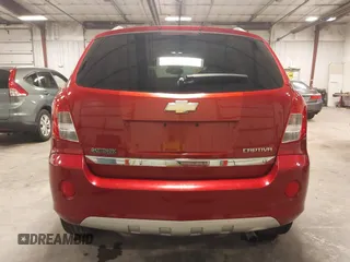 2014 Chevrolet Captiva Sport LT z VIN 3GNAL3EK2ES609279, wystawiony jako IAAI lot #42135344 z przebiegiem 46 330 mil mil oraz . Historia ofert i sprzedaży dostępna na DreamBid. Obrazek 17.