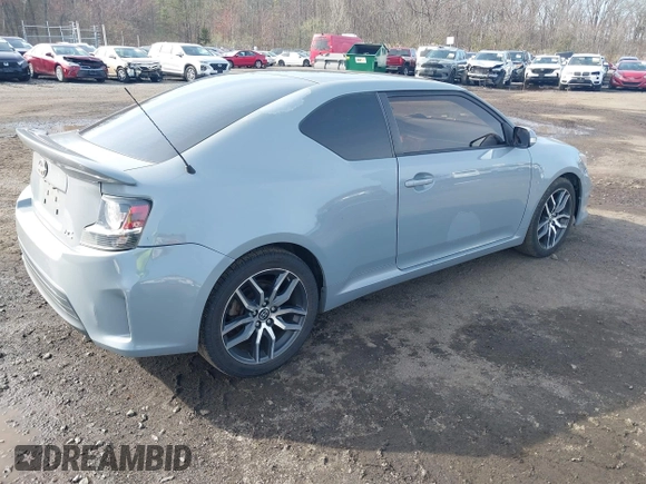 2014 Scion tC z VIN JTKJF5C71E3081033, wystawiony jako IAAI lot #41928949 z przebiegiem 144 112 mil mil oraz . Historia ofert i sprzedaży dostępna na DreamBid. Obrazek 4.