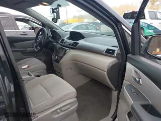 2016 Honda Odyssey SE with VIN 5FNRL5H39GB155488, listed as a IAAI auction lot 41702336 with 122,164 mi miles. Bid and sale history available at carsss.com. Image 5.