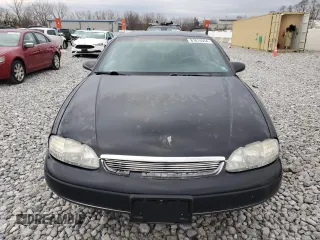 1999 Chevrolet Monte Carlo LS z VIN 2G1WW12M3X9280133, wystawiony jako Copart lot #81814554 z przebiegiem 81 630 mil mil oraz Szkoda całkowita • Salvage title. Historia ofert i sprzedaży dostępna na DreamBid. Obrazek 5.
