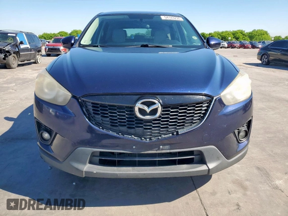 2013 Mazda CX-5 Touring with VIN JM3KE4CEXD0143205, listed as a Copart auction lot 54143235 with 258,715 mi miles and Clean Title. Bid and sale history available at carsss.com. Image 5.