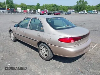 1999 Ford Escort LX z VIN 1FAFP10P7XW198467, wystawiony jako IAAI lot #42278961 z przebiegiem 293 835 mil mil oraz . Historia ofert i sprzedaży dostępna na DreamBid. Obrazek 3.