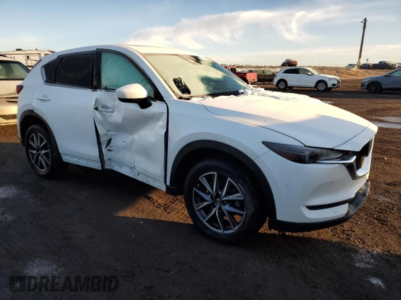 2018 Mazda CX-5 Grand Touring with VIN JM3KFBDM7J0370662, listed as a Copart auction lot 48602585 with 67,875 mi miles and Salvage Title. Bid and sale history available at DreamBid. Image 4.