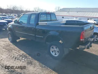 1997 Ford F-150 XL with VIN 1FTDX18W7VKC26527, listed as a IAAI auction lot 41692112 with 187,720 mi miles. Bid and sale history available at carsss.com. Image 3.