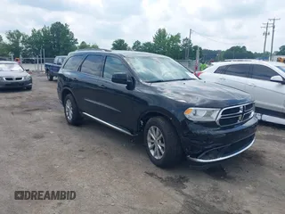 2017 Dodge Durango SXT z VIN 1C4RDJAG7HC860405, wystawiony jako IAAI lot #42669206 z przebiegiem 165 936 mil mil oraz . Historia ofert i sprzedaży dostępna na DreamBid. Obrazek 1.