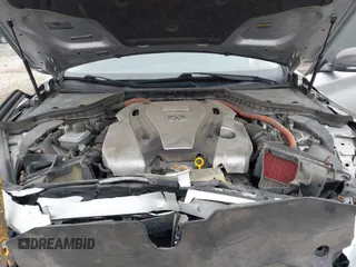 2014 Infiniti Q50 Hybrid Sport with VIN JN1AV7AR3EM703431, listed as a IAAI auction lot 41710414 with 213,611 mi miles. Bid and sale history available at carsss.com. Image 10.