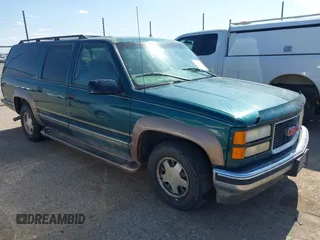 1998 GMC Suburban z VIN 3GKEC16R2WG509363, wystawiony jako IAAI lot #42180155 z przebiegiem 191 066 mil mil oraz . Historia ofert i sprzedaży dostępna na DreamBid. Obrazek 1.