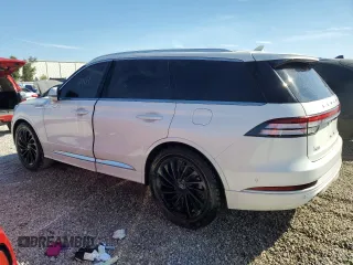 2021 Lincoln Aviator Reserve z VIN 5LM5J7WCXMGL18310, wystawiony jako Copart lot #76247904 z przebiegiem 69 111 mil mil oraz Nie do naprawy • Non repairable. Historia ofert i sprzedaży dostępna na DreamBid. Obrazek 2.