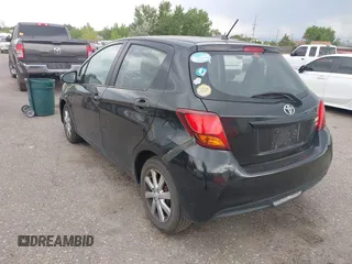 2015 Toyota Yaris L with VIN VNKKTUD33FA017154, listed as a IAAI auction lot 39828518 with 248,632 mi miles. Bid and sale history available at carsss.com. Image 3.