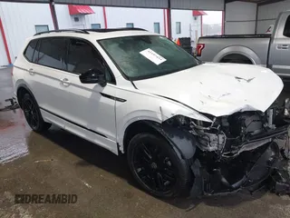 2022 Volkswagen Tiguan SE R-Line Black with VIN 3VVCB7AX8NM139424, listed as a IAAI auction lot 41197454 with 75,341 mi miles and . Bid and sale history available at DreamBid. Image 1.