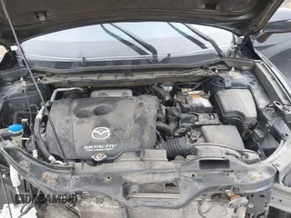 2015 Mazda CX-5 Sport with VIN JM3KE4BY9F0495948, listed as a IAAI auction lot 41501840 with 145,959 mi miles. Bid and sale history available at carsss.com. Image 10.