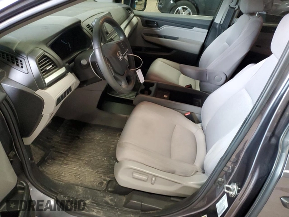 2019 Honda Odyssey LX with VIN 5FNRL6H24KB101473, listed as a Copart auction lot 51894325 with 66,285 mi miles and Salvage Title. Bid and sale history available at DreamBid. Image 7.