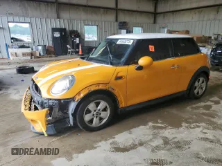 2017 MINI Hardtop Cooper with VIN WMWXP5C37H2D17030, listed as a Copart auction lot 54658275 with 144,308 mi miles and Salvage title. Bid and sale history available at DreamBid. Image 1.
