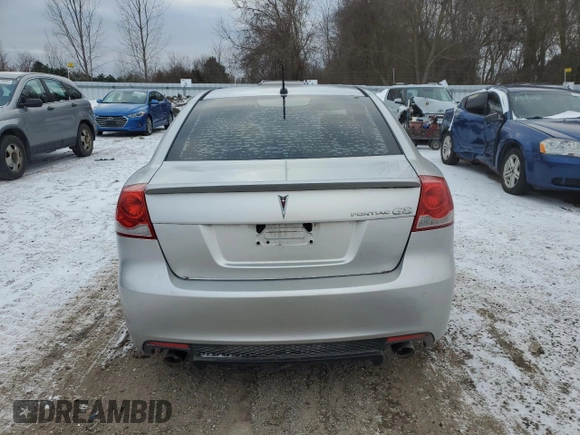 2009 Pontiac G8 z VIN 6G2ER57729L223218, wystawiony jako Copart lot #84234214 z przebiegiem 222 165 mil mil oraz Szkoda całkowita • Salvage title. Historia ofert i sprzedaży dostępna na DreamBid. Obrazek 6.