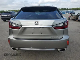 2017 Lexus RX 350 with VIN 2T2BZMCA2HC114007, listed as a Copart auction lot 63587985 with 61,421 mi miles and Salvage title. Bid and sale history available at DreamBid. Image 6.