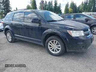 2015 Dodge Journey SXT with VIN 3C4PDCBG5FT742257, listed as a IAAI auction lot 42577447 with 128,816 mi miles and . Bid and sale history available at DreamBid. Image 1.