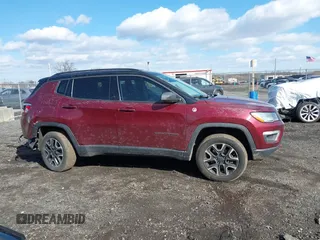 2020 Jeep Compass Trailhawk with VIN 3C4NJDDB2LT239384, listed as a IAAI auction lot 41527372 with 56,122 mi miles and . Bid and sale history available at carsss.com. Image 13.