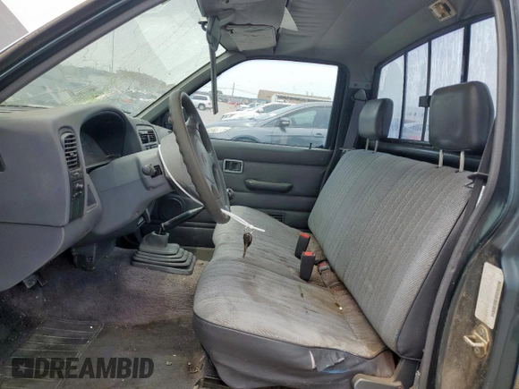 1994 Nissan Frontier with VIN 1N6SD11S2RC341136, listed as a Copart auction lot 57107995 with 174,479 mi miles and Salvage title. Bid and sale history available at DreamBid. Image 7.