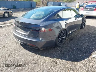 2021 Tesla Model S Long Range with VIN 5YJSA1E52MF428370, listed as a IAAI auction lot 41809773 with 34,372 mi miles and . Bid and sale history available at DreamBid. Image 4.
