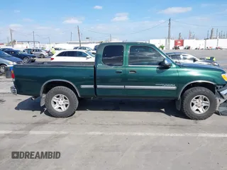 2000 Toyota Tundra SR5 with VIN 5TBRT3417YS122889, listed as a IAAI auction lot 41711107 with 288,475 mi miles and . Bid and sale history available at DreamBid. Image 13.