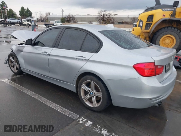 2013 BMW 3 Series 328i with VIN WBA3C1G59DNN93746, listed as a IAAI auction lot 41527720 with 215,442 mi miles and . Bid and sale history available at DreamBid. Image 3.