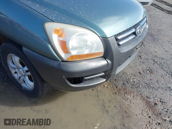 2005 Kia Sportage LX with VIN KNDJE723357058608, listed as a IAAI auction lot 41564533 with 262,794 mi miles and . Bid and sale history available at carsss.com. Image 6.