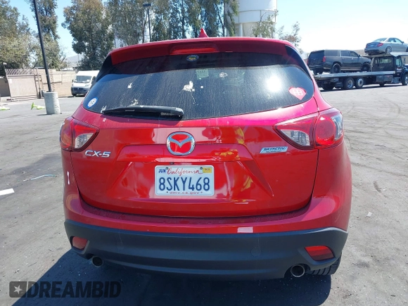 2016 Mazda CX-5 Grand Touring z VIN JM3KE2DY2G0660385, wystawiony jako IAAI lot #42101004 z przebiegiem 166 336 mil mil oraz . Historia ofert i sprzedaży dostępna na DreamBid. Obrazek 17.