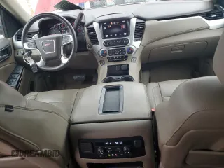 2015 GMC Yukon SLT z VIN 1GKS2BKC6FR154565, wystawiony jako Copart lot #50881225 z przebiegiem 160 669 mil mil oraz Szkoda całkowita • Salvage title. Historia ofert i sprzedaży dostępna na DreamBid. Obrazek 8.