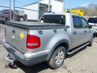 2007 Ford Explorer Sport Trac XLT z VIN 1FMEU51807UB19953, wystawiony jako IAAI lot #42154055 z przebiegiem 199 105 mil mil oraz . Historia ofert i sprzedaży dostępna na DreamBid. Obrazek 4.