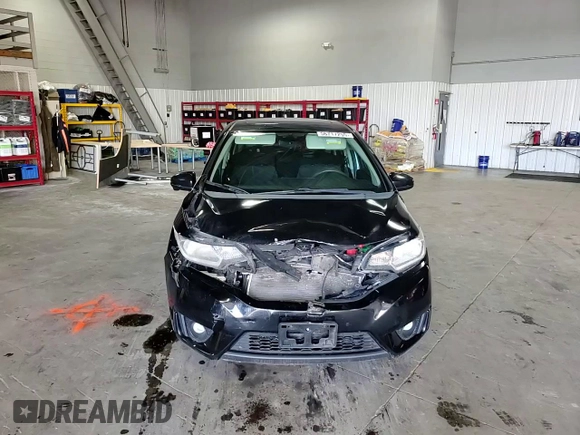2015 Honda Fit EX-L z VIN 3HGGK5H88FM721318, wystawiony jako Copart lot #56717255 z przebiegiem 107 235 mil mil oraz Szkoda całkowita • Salvage title. Historia ofert i sprzedaży dostępna na DreamBid. Obrazek 14.
