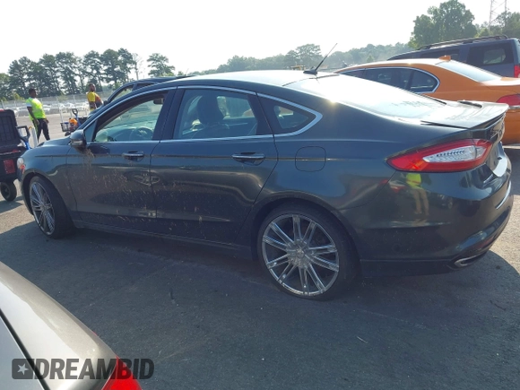 2016 Ford Fusion Titanium with VIN 3FA6P0K90GR188049, listed as a IAAI auction lot 42575477 with 239,414 mi miles and . Bid and sale history available at DreamBid. Image 14.