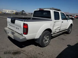 2004 Nissan Frontier XE z VIN 1N6ED27T44C450726, wystawiony jako Copart lot #57004045 z przebiegiem 151 638 mil mil oraz Szkoda całkowita • Salvage title. Historia ofert i sprzedaży dostępna na DreamBid. Obrazek 3.