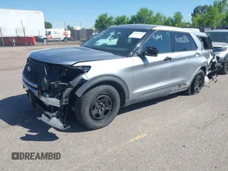 2022 Ford Police Interceptor z VIN 1FM5K8AC1NGA54845, wystawiony jako IAAI lot #42652519 z przebiegiem 17 893 mil mil oraz . Historia ofert i sprzedaży dostępna na DreamBid. Obrazek 18.