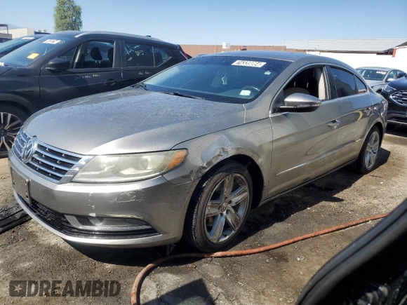 2013 Volkswagen CC Sport with VIN WVWBP7ANXDE532775, listed as a Copart auction lot 74339064 with 100,571 mi miles and Clean Title. Bid and sale history available at carsss.com. Image 1.