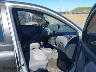 2002 Toyota ECHO with VIN JTDBT123120243848, listed as a IAAI auction lot 41677515 with 287,759 mi miles. Bid and sale history available at carsss.com. Image 5.